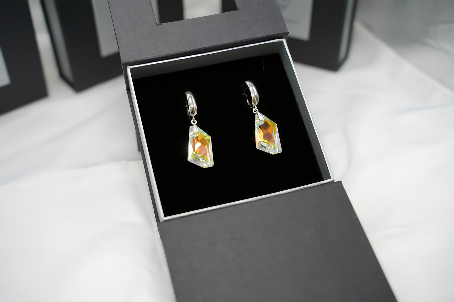 Lichtreflex-Ohrringe mit Swarovski® 1003o