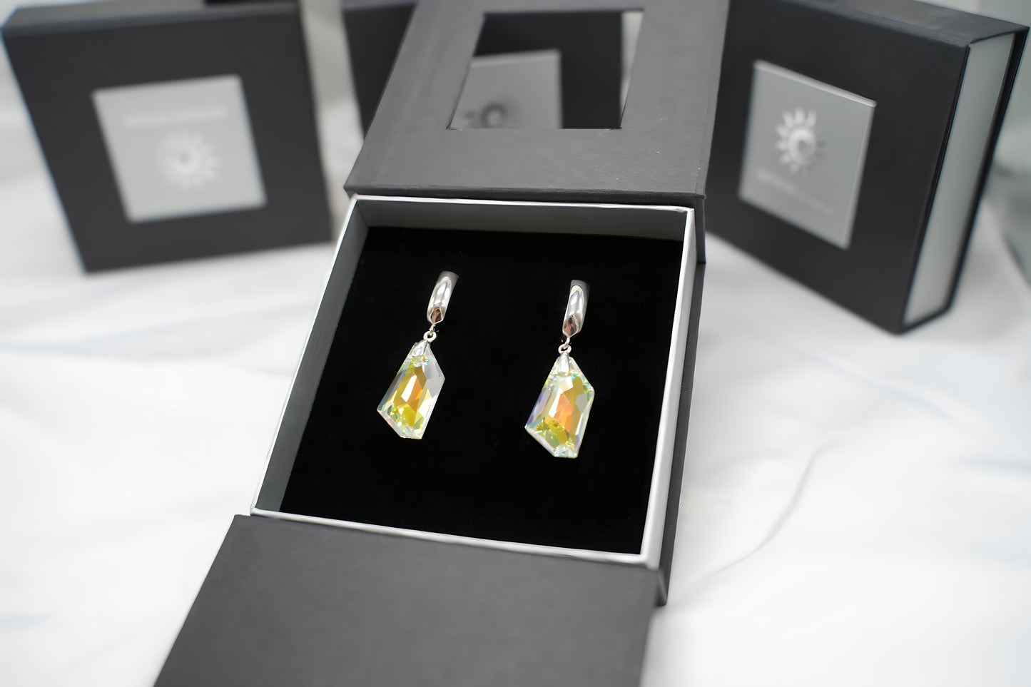 Lichtreflex-Ohrringe mit Swarovski® 1003o