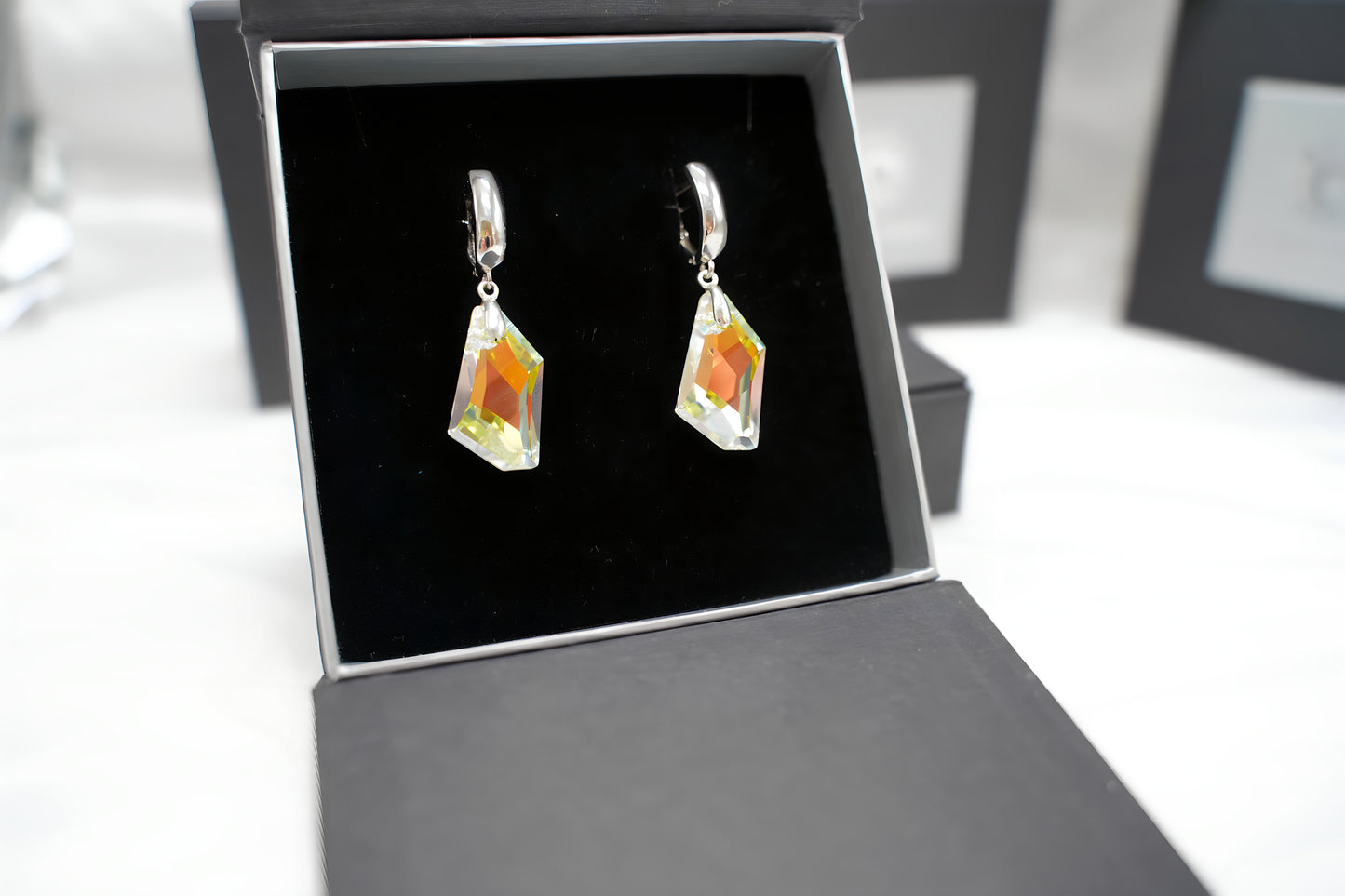 Lichtreflex-Ohrringe mit Swarovski® 1003o